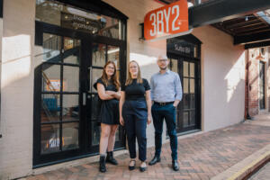 The 3BY2 team standing outside the 3BY2 office in Perth